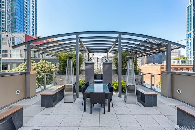 333 1st St Unit N1404, San Francisco, CA 94105 - view of patio / terrace with a pergola and a view of city