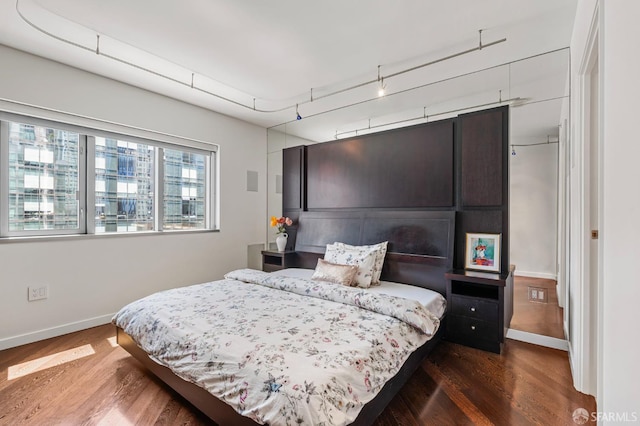 333 1st St Unit N1404, San Francisco, CA 94105 - bedroom featuring wood finished floors and baseboards