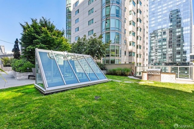 333 1st St Unit N1404, San Francisco, CA 94105 - view of community featuring a yard and area for grilling