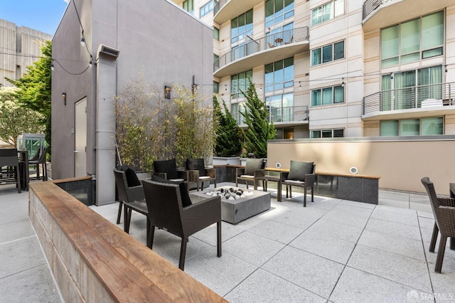 333 1st St Unit N1404, San Francisco, CA 94105 - view of patio with an outdoor living space with a fire pit
