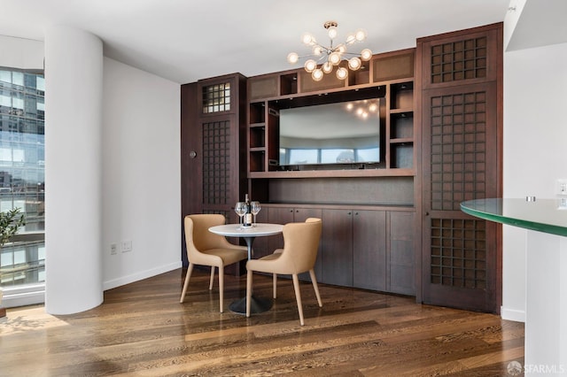 333 1st St Unit N1404, San Francisco, CA 94105 - dining space featuring wood finished floors, a chandelier, and baseboards