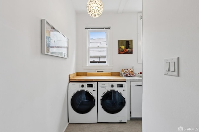 1250 Vallejo St Unit 2, San Francisco, CA 94109 - laundry area with separate washer and dryer and light colored carpet