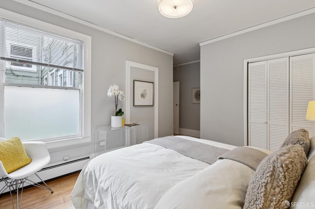 1250 Vallejo St Unit 2, San Francisco, CA 94109 - bedroom with crown molding, wood finished floors, and a closet