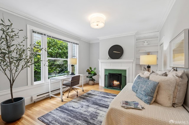 1250 Vallejo St Unit 2, San Francisco, CA 94109 - living room featuring crown molding, wood finished floors, a tiled fireplace, a baseboard radiator, and an office area