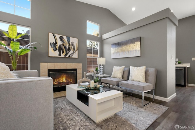 1017 Rockspring Way, Antioch, CA 94531 - living room with a fireplace, wood finished floors, high vaulted ceiling, and recessed lighting