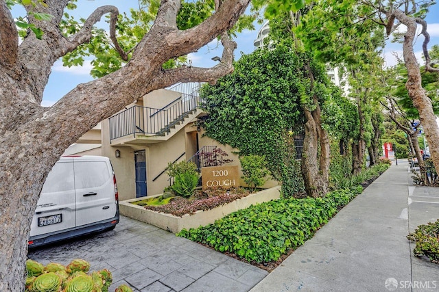 1200 Gough St Unit 4B, San Francisco, CA 94109 - view of side of property featuring stucco siding and a balcony