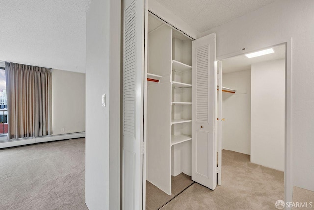 1200 Gough St Unit 4B, San Francisco, CA 94109 - closet featuring a baseboard heating unit