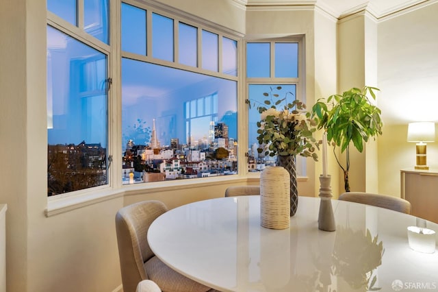 dining room featuring ornamental molding