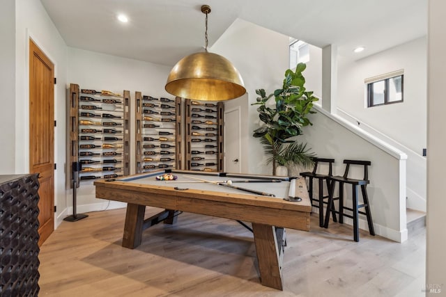 game room with baseboards, recessed lighting, and light wood-style floors
