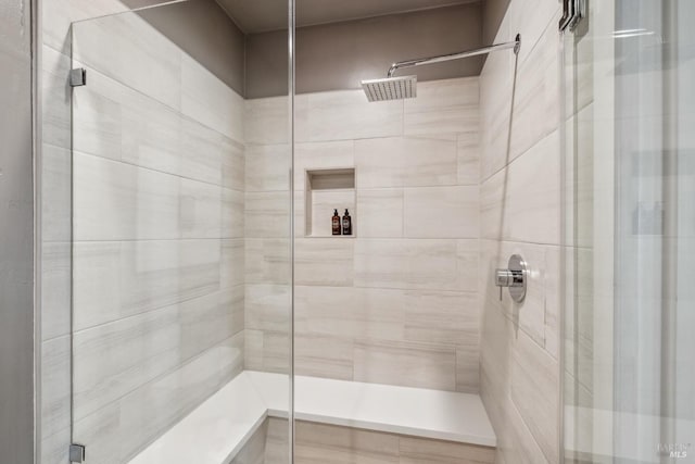 bathroom featuring a shower stall
