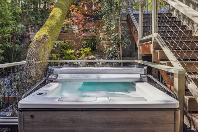 deck with a hot tub