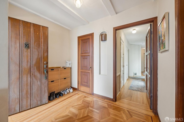 hallway with light parquet flooring