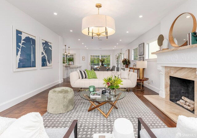 192 Yerba Buena Ave, San Francisco, CA 94127 - living area featuring baseboards, recessed lighting, a fireplace, and a chandelier