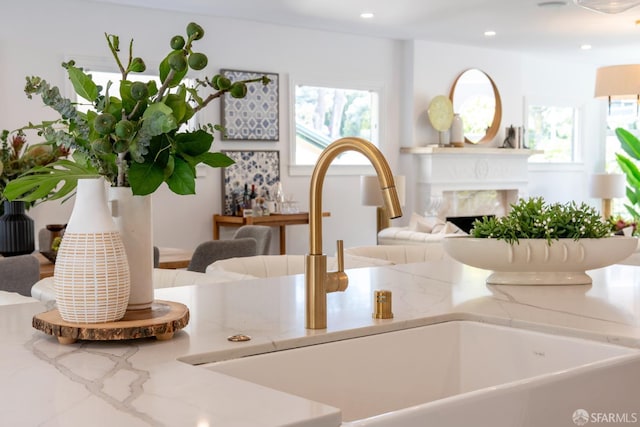 192 Yerba Buena Ave, San Francisco, CA 94127 - kitchen view of a sink, light stone counters, recessed lighting, and a high end fireplace