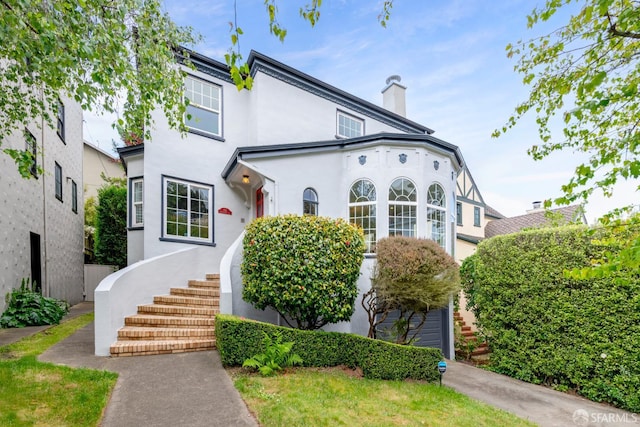 192 Yerba Buena Ave, San Francisco, CA 94127 - view of front of home with stucco siding, a chimney, and stairway
