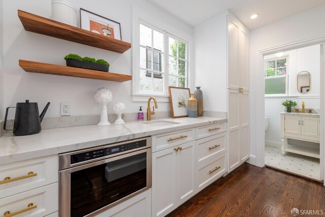 192 Yerba Buena Ave, San Francisco, CA 94127 - kitchen featuring a sink, white cabinets, light stone countertops, dark wood finished floors, and recessed lighting