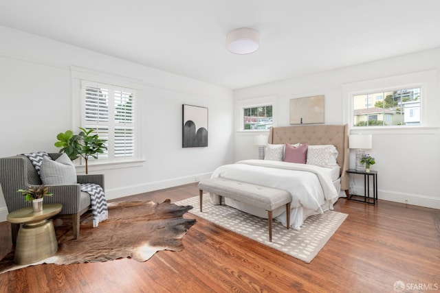 192 Yerba Buena Ave, San Francisco, CA 94127 - bedroom featuring multiple windows, wood finished floors, and baseboards
