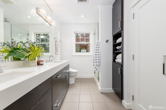 192 Yerba Buena Ave, San Francisco, CA 94127 - full bathroom with a stall shower, toilet, baseboards, double vanity, and recessed lighting