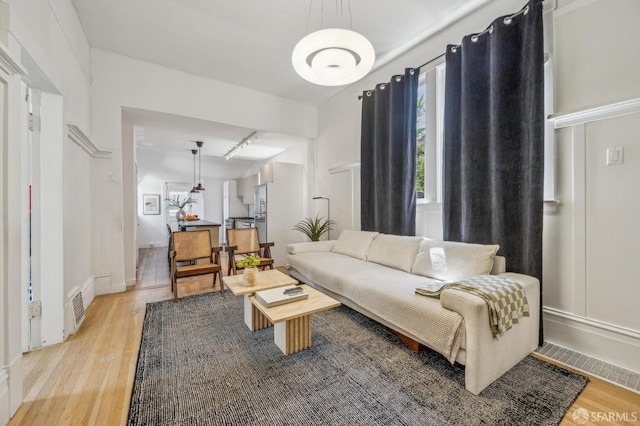 411 Clipper St, San Francisco, CA 94114 - living area featuring light wood-style flooring