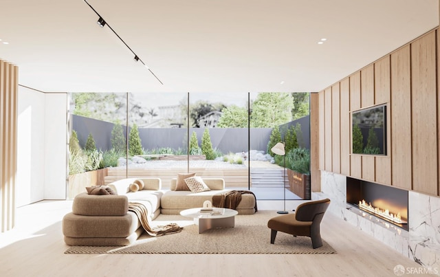 411 Clipper St, San Francisco, CA 94114 - living area featuring expansive windows, a large fireplace, and wood finished floors