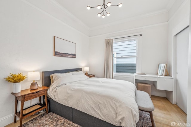 411 Clipper St, San Francisco, CA 94114 - bedroom with a chandelier, ornamental molding, and light wood-style floors