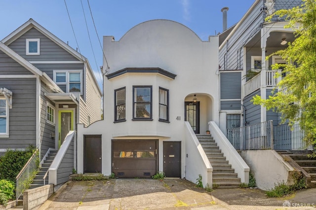 411 Clipper St, San Francisco, CA 94114 - view of front facade featuring stairs and stucco siding