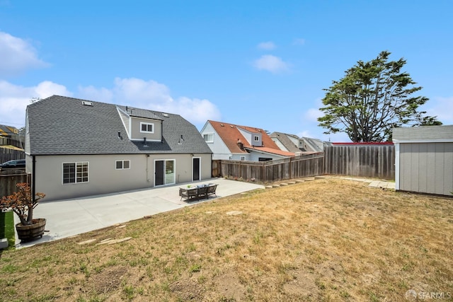 212 Kavanaugh Way, Pacifica, CA 94044 - back of property featuring a fenced backyard, a patio area, roof with shingles, stucco siding, and a shed