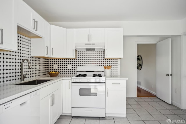212 Kavanaugh Way, Pacifica, CA 94044 - kitchen with under cabinet range hood, white appliances, light countertops, and backsplash