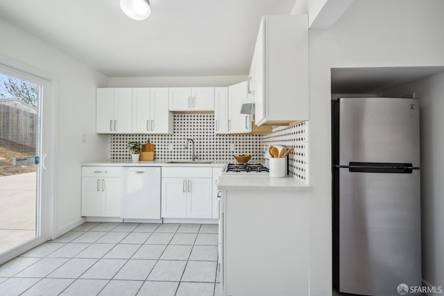 212 Kavanaugh Way, Pacifica, CA 94044 - kitchen featuring freestanding refrigerator, white dishwasher, light countertops, and white cabinetry