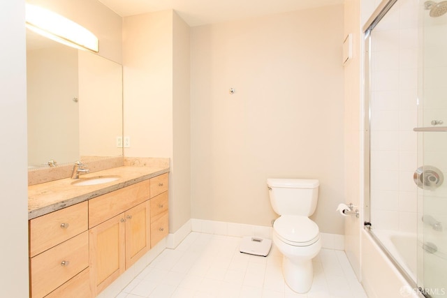 full bathroom featuring vanity, tile patterned flooring, enclosed tub / shower combo, and toilet