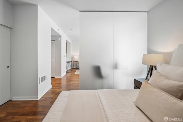 555 4th St Unit 636, San Francisco, CA 94107 - bedroom featuring wood finished floors and baseboards