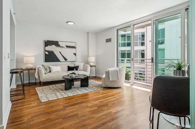555 4th St Unit 636, San Francisco, CA 94107 - living room featuring wood finished floors