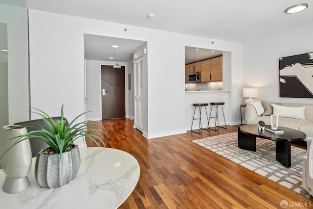 555 4th St Unit 636, San Francisco, CA 94107 - living room featuring wood finished floors and baseboards