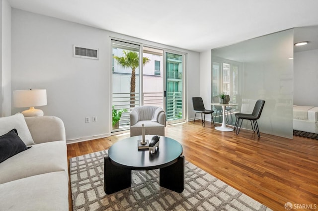 555 4th St Unit 636, San Francisco, CA 94107 - living room with wood finished floors and baseboards