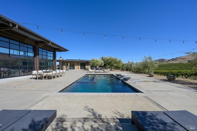 pool with a patio