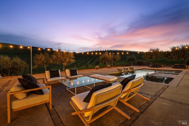view of patio / terrace with an outdoor pool