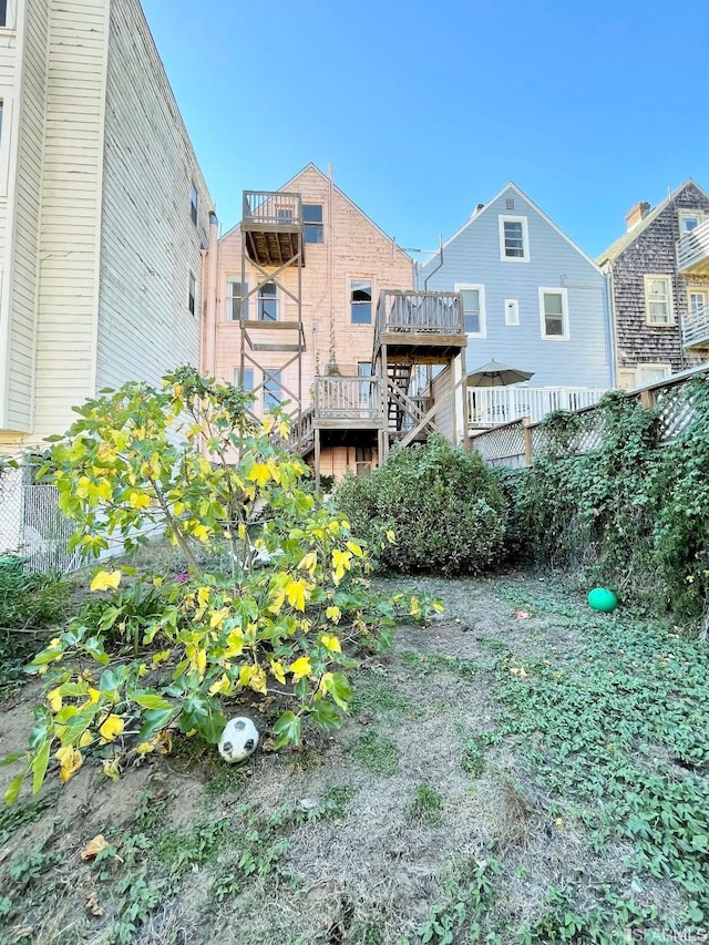 view of yard featuring a wooden deck