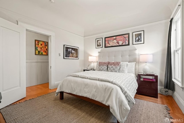 bedroom with light wood-style floors