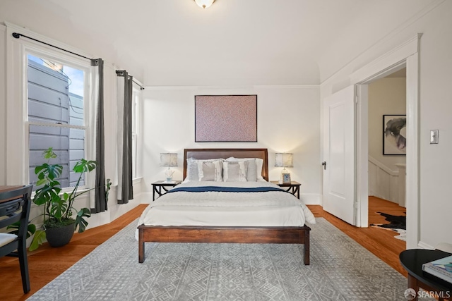 bedroom featuring wood finished floors