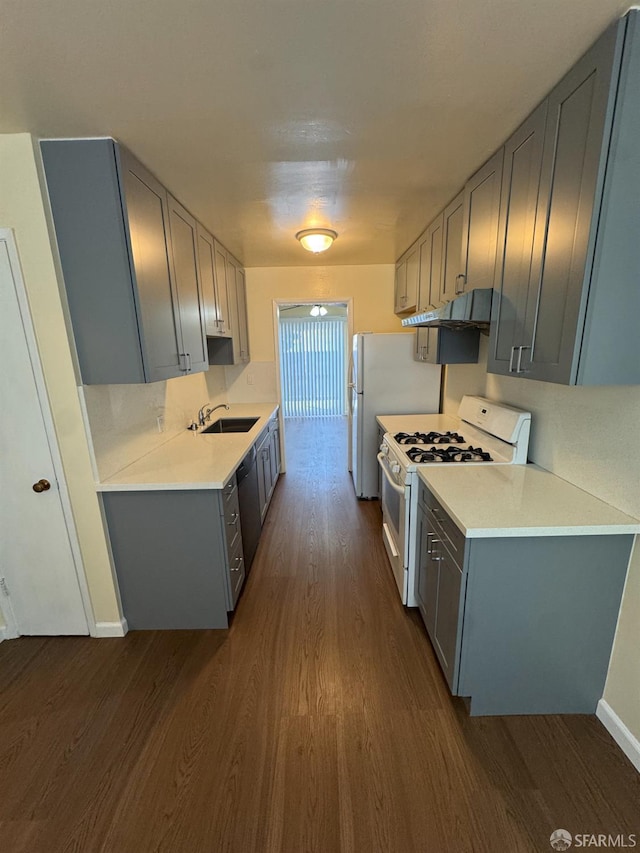 130 Albatross Ct Unit 16, San Francisco, CA 94124 - kitchen featuring white appliances, a sink, gray cabinetry, and dark wood-type flooring