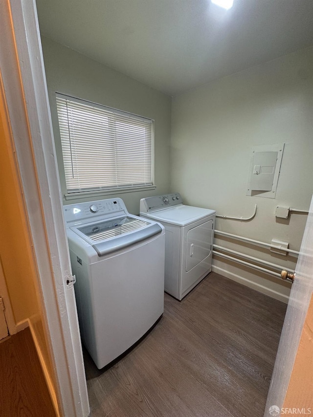 130 Albatross Ct Unit 16, San Francisco, CA 94124 - washroom with wood finished floors, washing machine and clothes dryer, electric panel, and baseboards