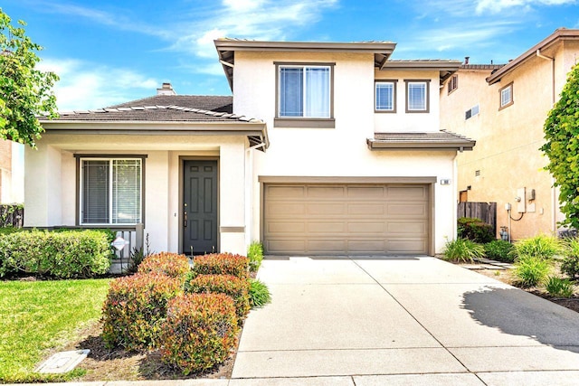 168 Cymbidium Cir, South San Francisco, CA 94080 - view of front of home with stucco siding, concrete driveway, an attached garage, and a tile roof