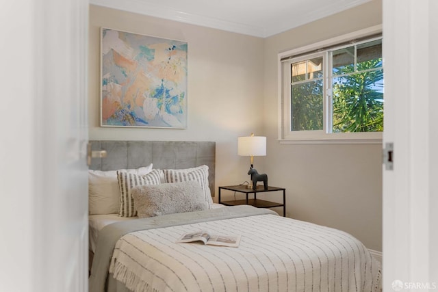 bedroom featuring ornamental molding