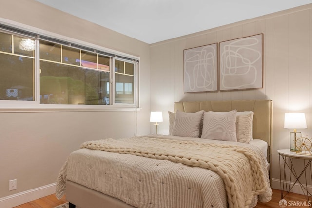 bedroom featuring hardwood / wood-style floors