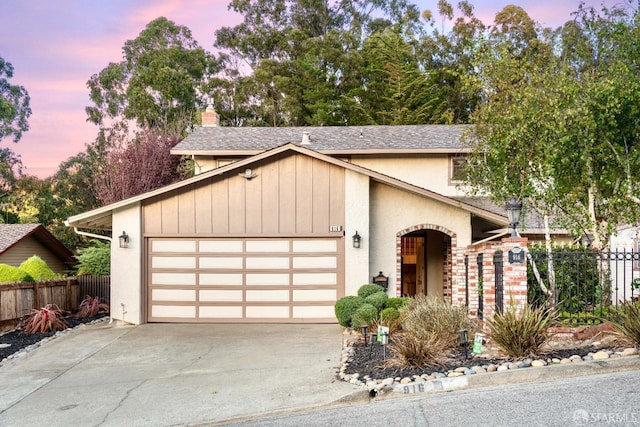 view of front of property with a garage