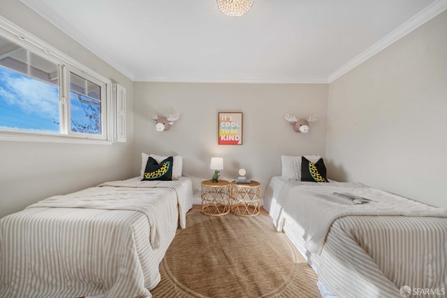 bedroom with crown molding