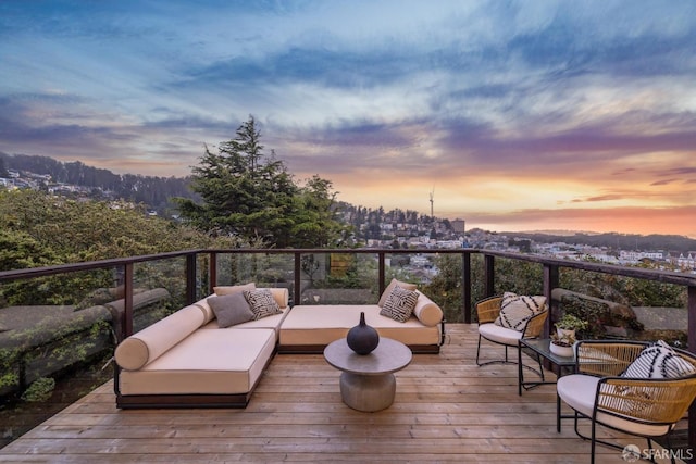 view of wooden balcony featuring a wooden deck and outdoor lounge area