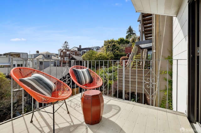 balcony featuring a residential view