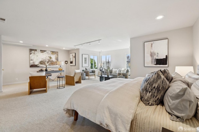 bedroom with carpet, visible vents, baseboards, and recessed lighting