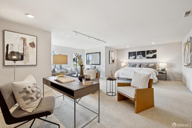 bedroom with light carpet, visible vents, baseboards, track lighting, and recessed lighting